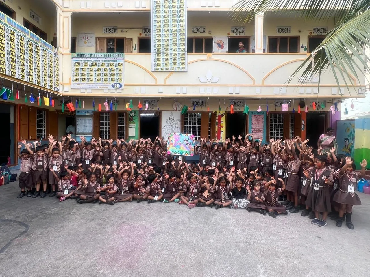 Vignana Vardhini students and staff gathered in the school courtyard