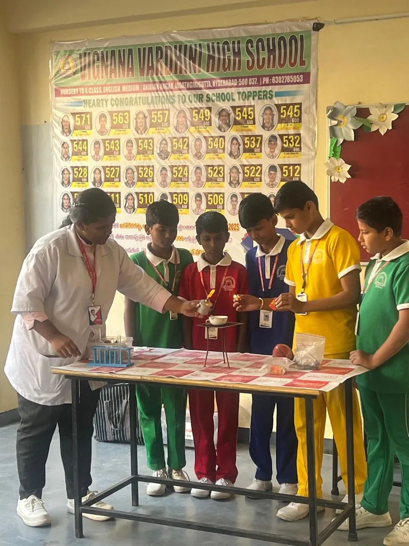Students in a hands-on academic session with their teacher
