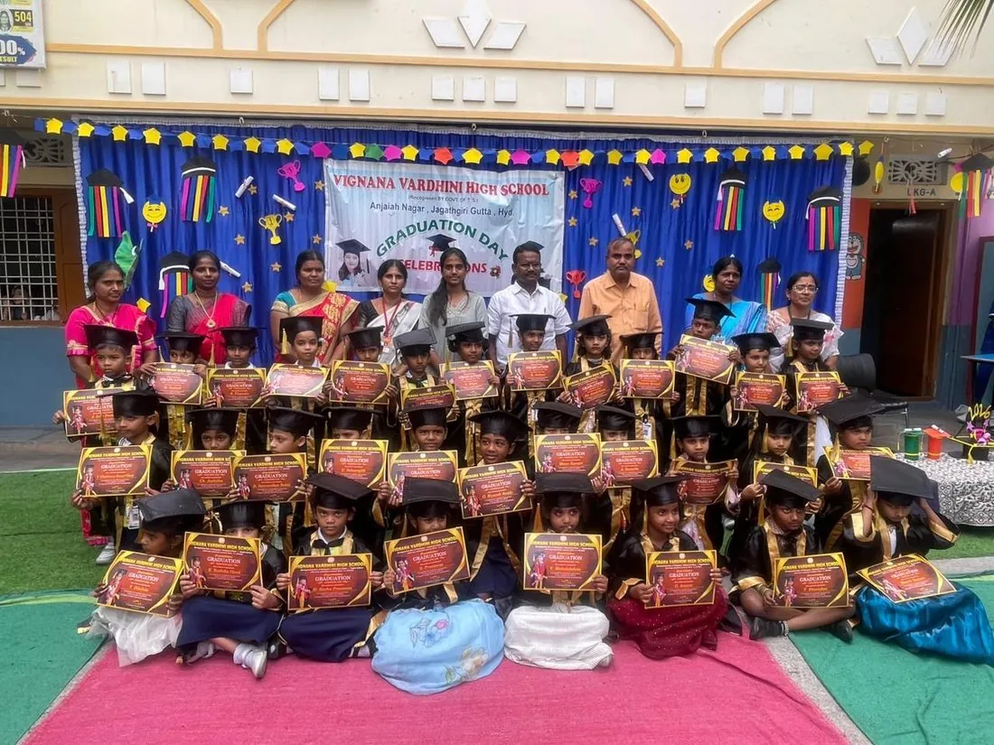 Graduation Day — students with their certificates