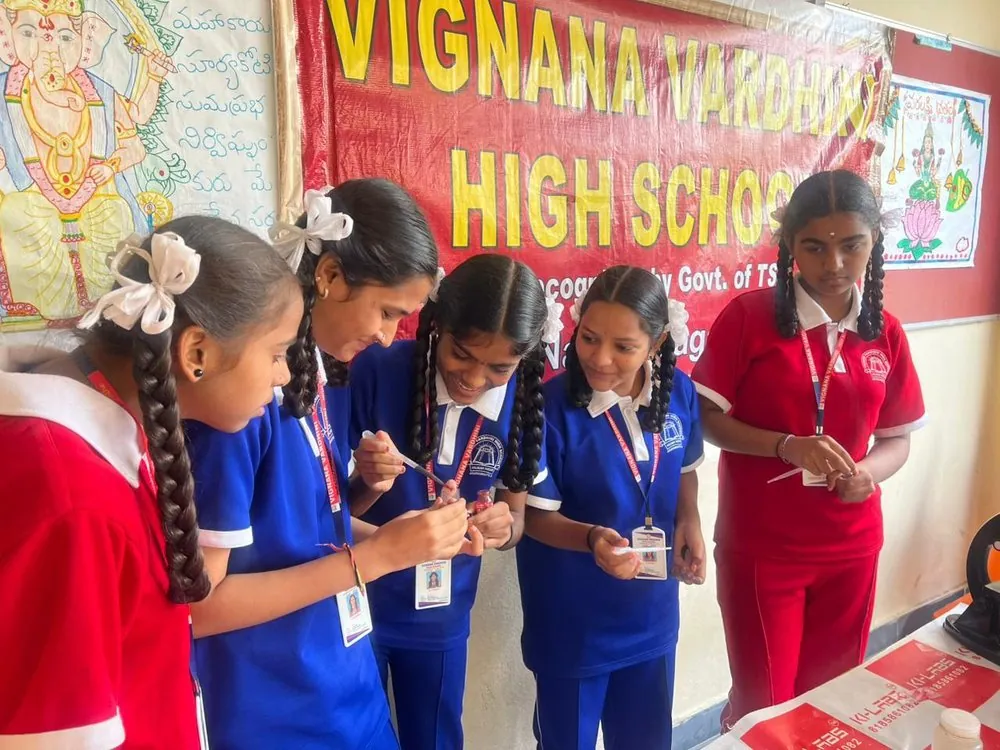 Students presenting at a science exhibition