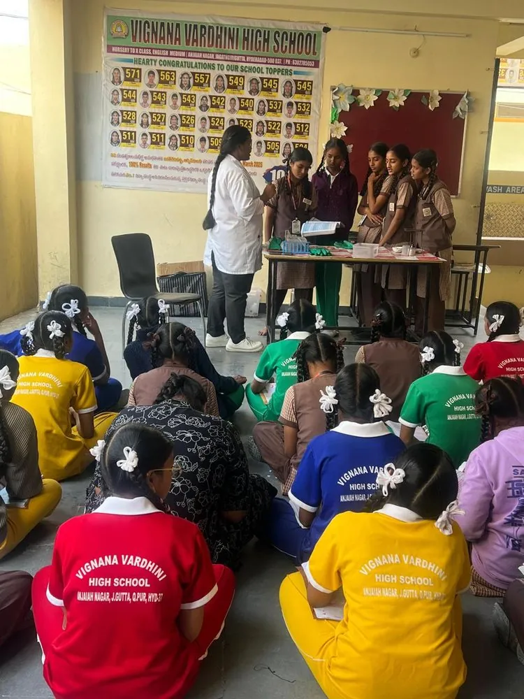 A teacher guiding students in class